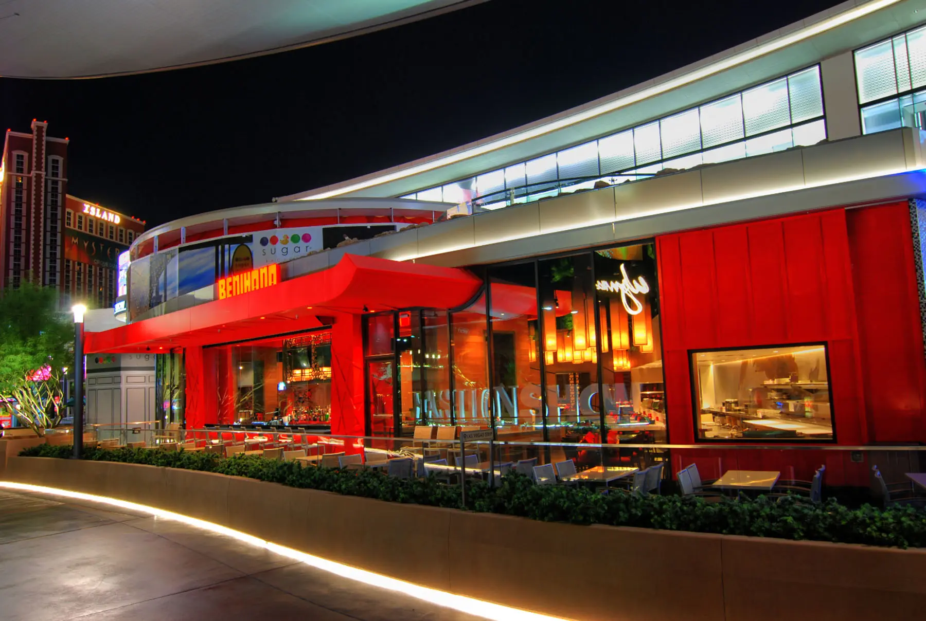 
                    a red building with a red awning