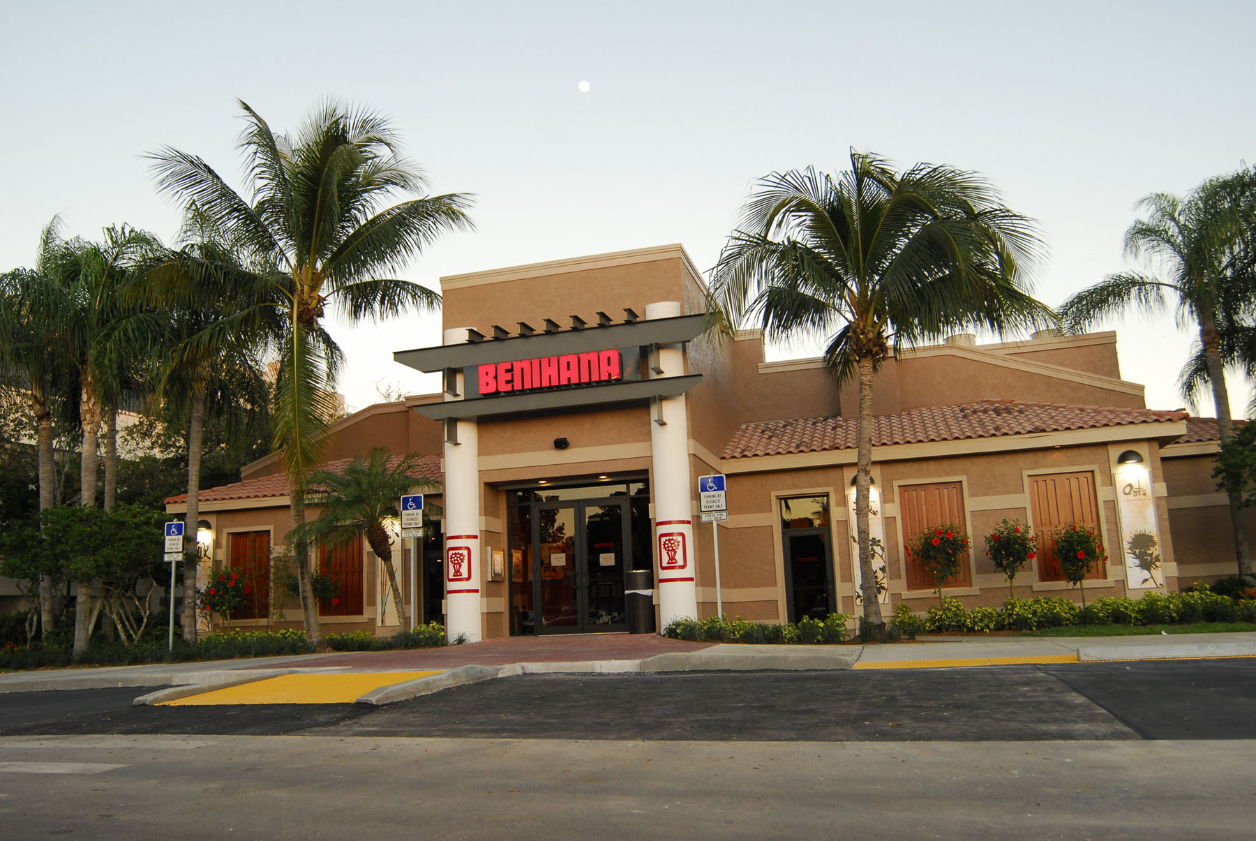 
                    a building with palm trees