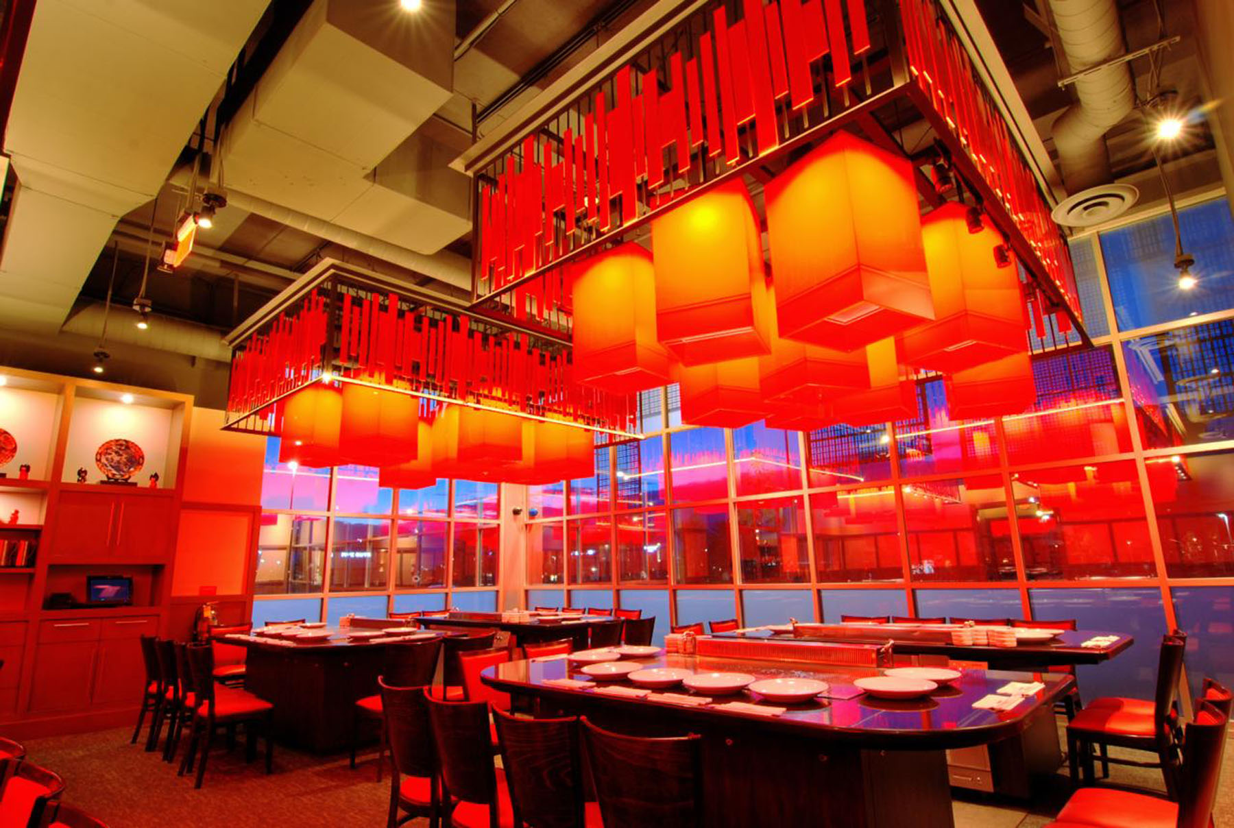 
                    a restaurant with red lights