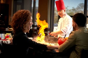 A couple enjoying teppanyaki experience at Benihana